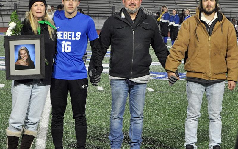 Andrew Jones was honored during the senior night ceremony at Fannin’s home soccer game against Gordon Central Friday, February 19. Shown during the ceremony are, from left, Melinda Jones, mother, holding a photo of the late Sydnie Jones; Jones, senior; Anthony Jones, father; and Connor Jones, brother.