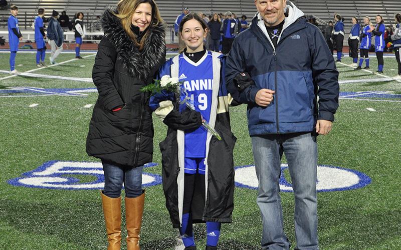 Isabella Tocci was one of 14 seniors honored during Fannin’s home soccer game against Gordon Central Friday, February 19. She is shown being escorted by Erik and Christina Cioffi.