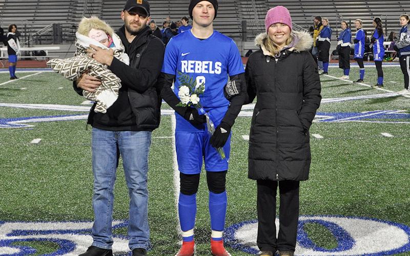 Eli Brisbay was honored during the senior night ceremony at Fannin’s home soccer game against Gordon Central Friday, February 19. Shown during the ceremony are, from left Jared Coffinger, father; Brisbay, senior; and Ashley Coffinger, mother.