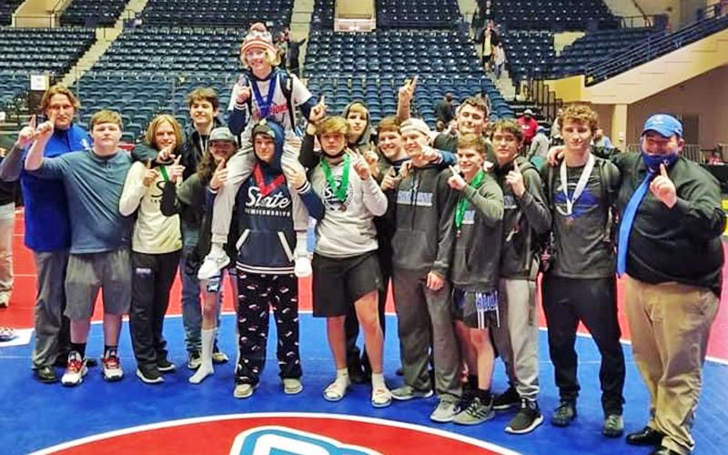 The Fannin County Rebels wrestling team won their first state championship as they topped Lovett in the state title match. The Rebels’ wrestling team are shown following the big win, which was the first male athletic team to win a state championship at Fannin County High School.