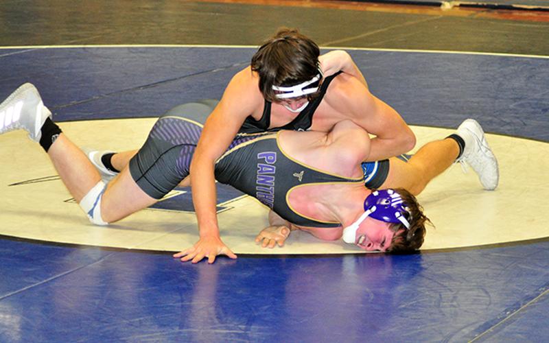Corbin Davenport works his opponent in recent action for the Fannin County Rebels wrestling team.