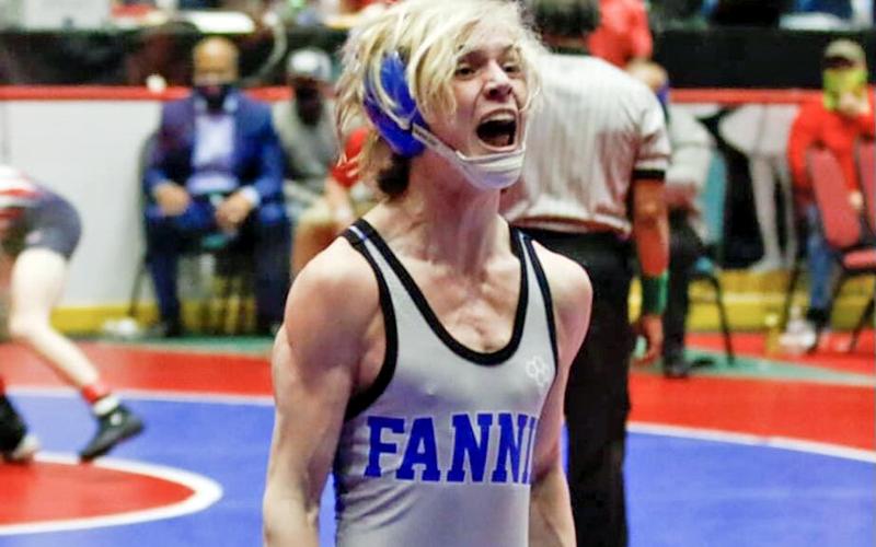 Blake Summers celebrates after his match that crowned him state champion. Summers is the only freshman to win an individual state title in Fannin County High School history.