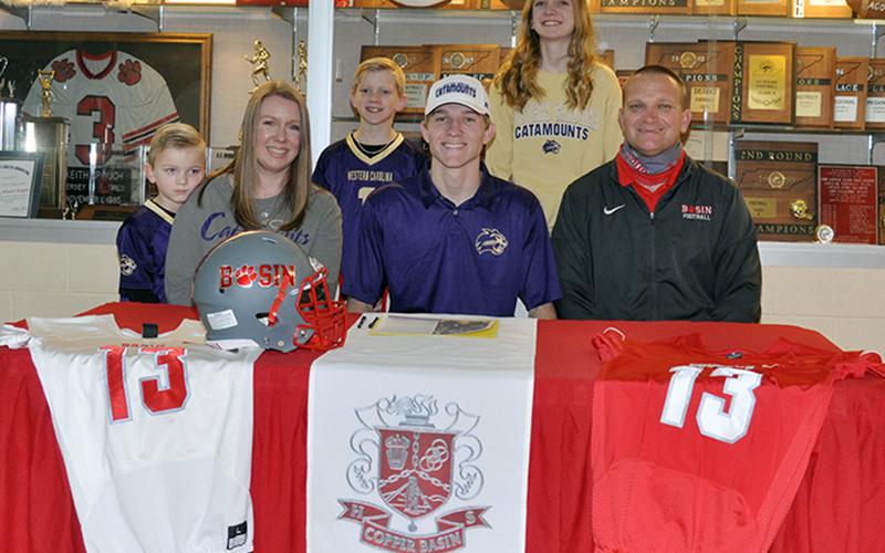 Copper Basin quarterback Bryson Grabowski signed his letter of intent to further his academic and athletic football career at Western Carolina University Wednesday, February 3. Shown following the signing ceremony are, from left, front, brother, Eli Grabowski; mother, Amber Grabowski; senior Grabowski; father, Chad Grabowski; and back, brother, Kaeden Grabowski; and sister, Peyton Grabowski.