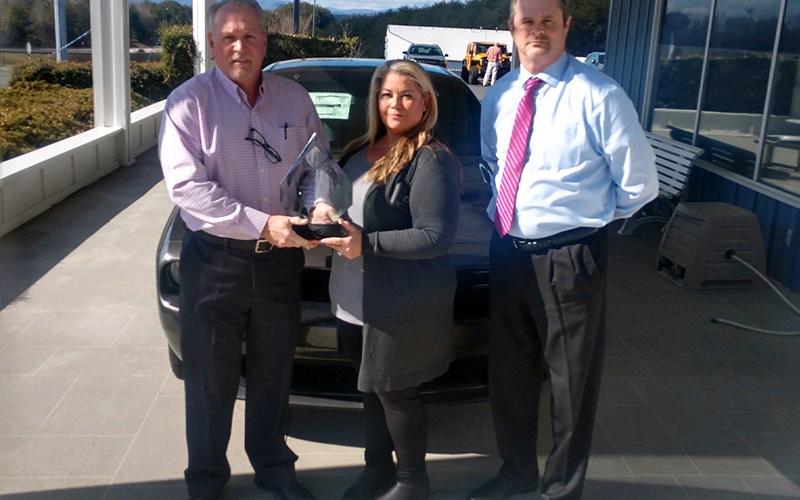Mountain Valley Motors collected over 100 toys for Toys for Tots this past year and won the car dealership award for Most Toys Collected. Shown are, from left, Brad Rose, Toys for Tots Coordinator Cheryl Jordan and Jason Neal.