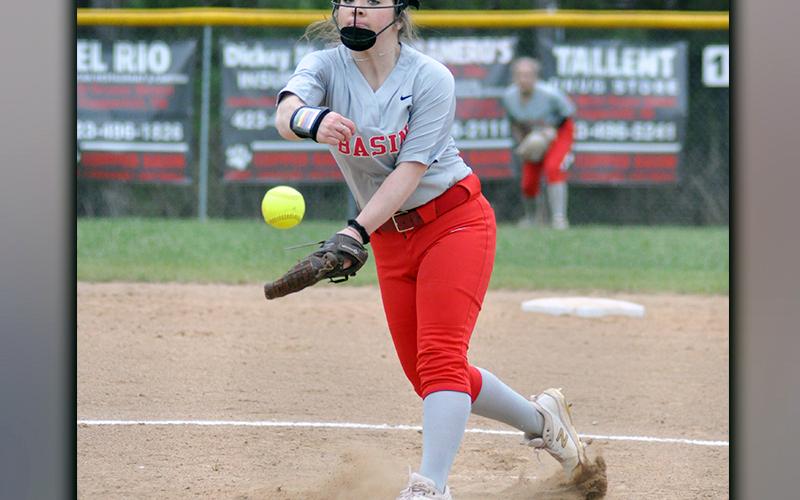 Kaitlyn Goode throws one of her many strikes in the Lady Cougars game against Chattanooga Girls Leadership Academy Monday, March 15. Goode ended game one of the double header with nine strike-outs.