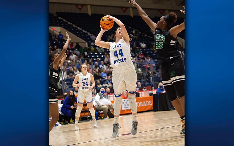 Senior Olivia Sisson shoots a two-point basket in the paint during the Lady Rebels’ state championship game against Josey High School Thursday, March 11.