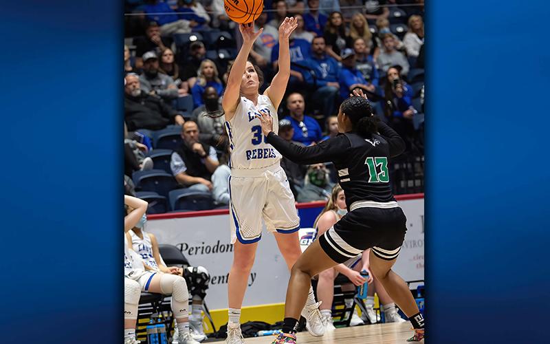 Lady Rebel Natalie Thomas shoots a three-point basket during Fannin County’s state championship game against Josey High School Thursday, March 11.