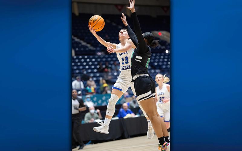 Fannin County’s Becca Ledford goes up for two of her 14 points against the Josey Lady Eagles in the AA Girls State Basketball Championship game in Macon Thursday, March 11. The Lady Rebels set the pace for three of four quarters, but couldn’t hold on in the last eight minutes for the victory.