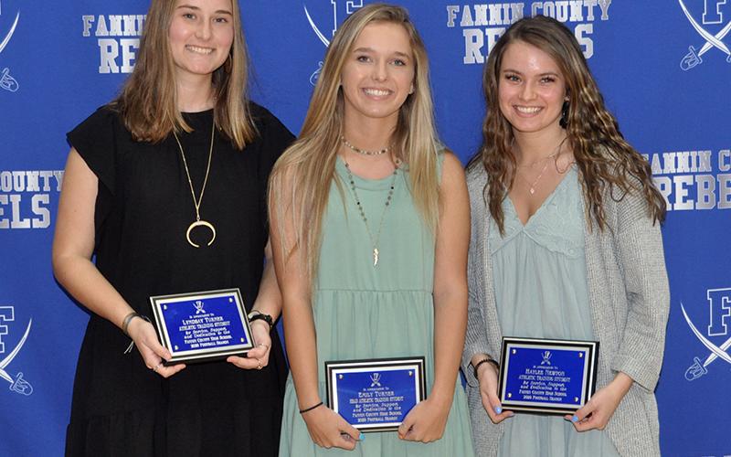The Fannin County High School Athletic Trainers were honored at the Rebels’ football banquet Tuesday, March 16. Trainers shown are, from left, Lydnsay Turner, Emily Turner and Haylee Newton.