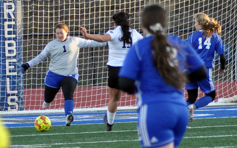 Lady Rebel goalkeeper Rachael Jessen kicks the ball away from the goal in recent action for the Lady Rebels’ soccer team.