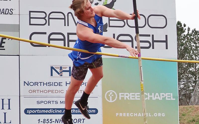James Mercer focuses as he pole vaults nine feet six inches to take a first place finish in the Rebels tri-match Tuesday, March 23.