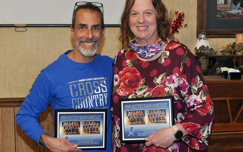 Fannin County cross country coaches Mike Cosentino  and Suzianne Pass were given plaques  with this years achievements for the boys and girls teams at the cross country end-of-season banquet Thursday, March 18.