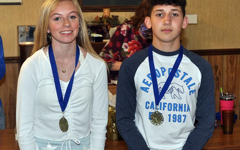 Freshmen Carlee Holloway and Zechariah Prater were awarded the “Runner of the Year” Award during Fannin County’s cross country end of season banquet Thursday, March 18. The award is given to the best placers for the men and women’s team for the season.