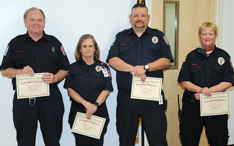 RIGHT: Spencer Kitchens, Becky Callihan, Bryan Herndon and Virginia Jones, from left, were honored with Outstanding Rescue Awards for their part in the Toccoa River rescue of  mother and son trapped in a kayak.