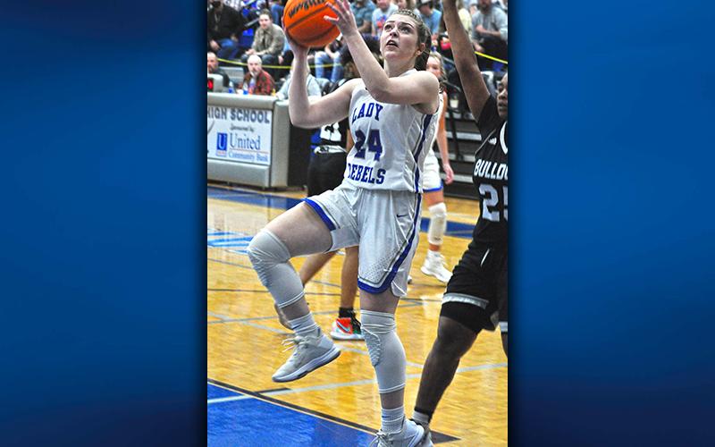 Olivia Sisson drives past a Butler defender in the Final Four matchup Saturday night at Fannin County High School. The 43-41 win advanced the Lady Rebels to the state championship game.