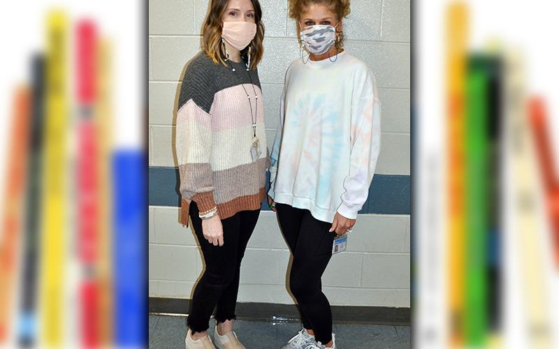 Staff participated in Dr. Seuss week by wearing several different colors Wednesday, March 3. Shown are fourth grade teachers Emily Adams, left, and Lisa Taylor.