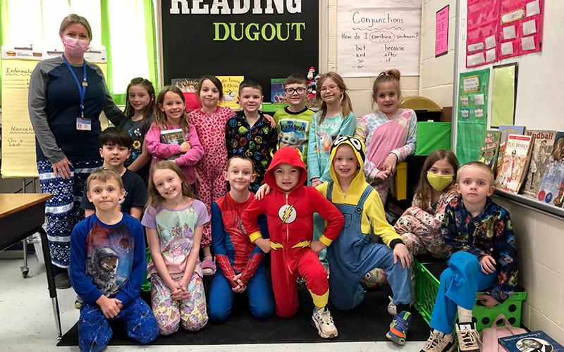 East Fannin Elementary School students and teachers donned their best sleepwear as they chose to “not sleep on reading” for Read Across America Week. Shown are, from left, front, Kendall Guay, Justin Lackey, Lily Cook, Jake Dyer, Landon Graham, Cord Cochran, Aris Kolacz and Jaxon Tatum; and back, teacher Teresa Martin, Emilie Hamilton, Annelise Hagan, Karissa Potts, Gage Kernea, Zander Sparks, Emma Black and Learh Rittenberry.