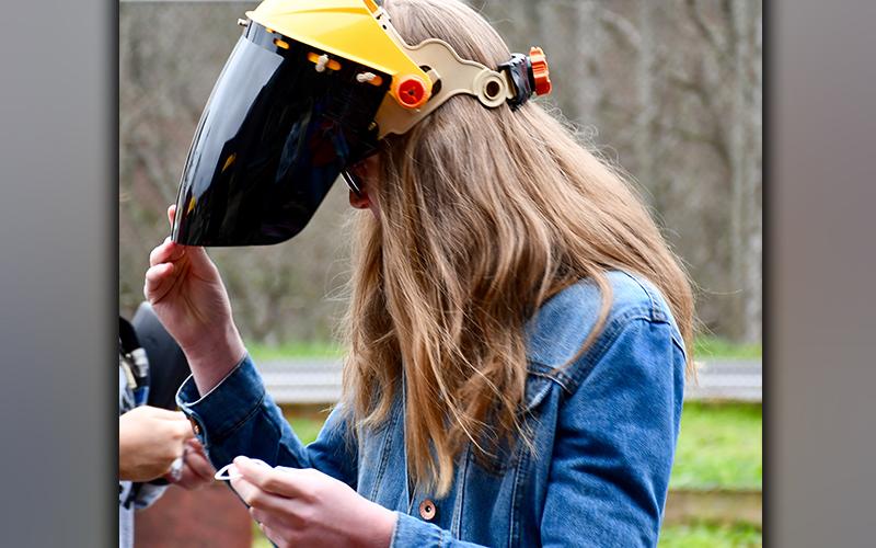 East Fannin Elementary School fifth grade student Claire Saxon prepares to safely observe Fannin County High School’s welding program in action.
