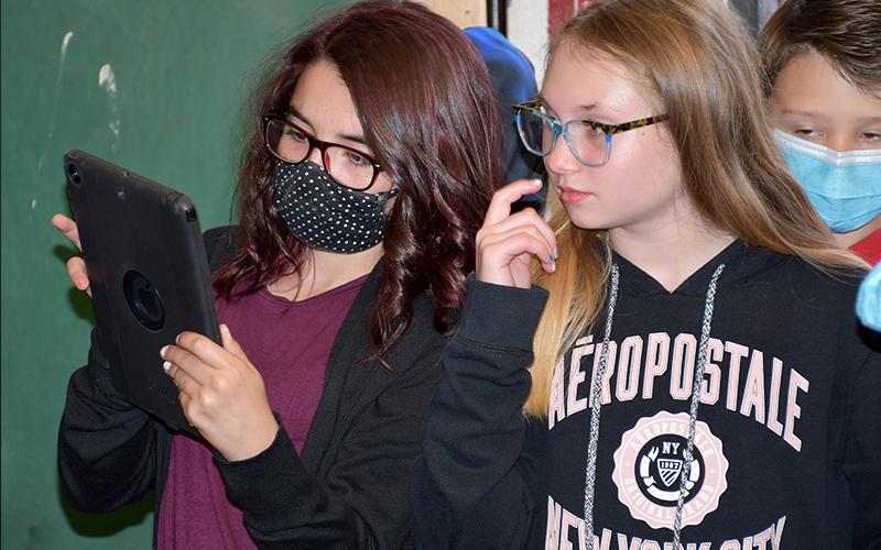 East Fannin Elementary School students Izzy Torres, left, and Venice Oliver explored Fannin County High School’s Career, Technology, Agricultural and Engineering (CTAE) opportunities and documented what they learned.