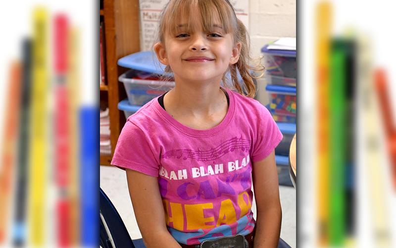 East Fannin Elementary School student Jade Fain was all smiles as she celebrated Read Across America Week with her classmates Wednesday, March 3.