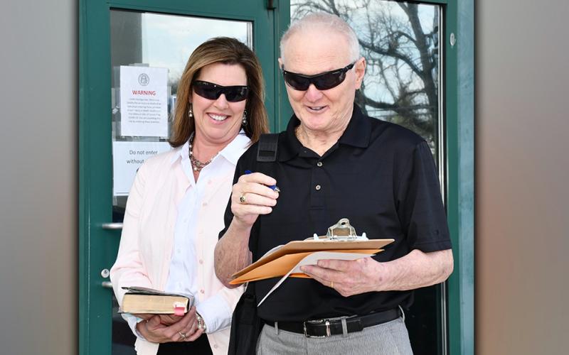 Johnny Scearce excitedly signed his oath of office with his wife, Brenda, by his side following his official swearing in as a post commissioner on the Fannin County Board of Commissioners Friday, March 26. Scearce thanked the community, his wife, family and God for all of the love and support he’s received since his initial COVID-19 diagnosis last fall.