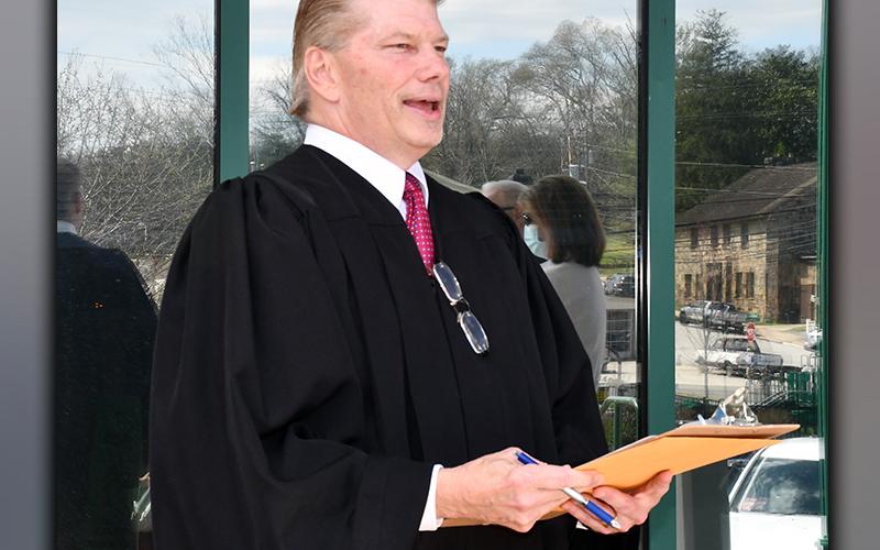 RIGHT: Fannin County Probate Court Judge Scott Kiker spoke to recently-elected Post One Commissioner Johnny Scearce’s determination and mettle during Scearce’s official swearing in Friday, March 26. Kiker described the opportunity to swear Scearce in as an “honor” and spoke to the renewed faith Scearce’s journey has stirred in him and the community.