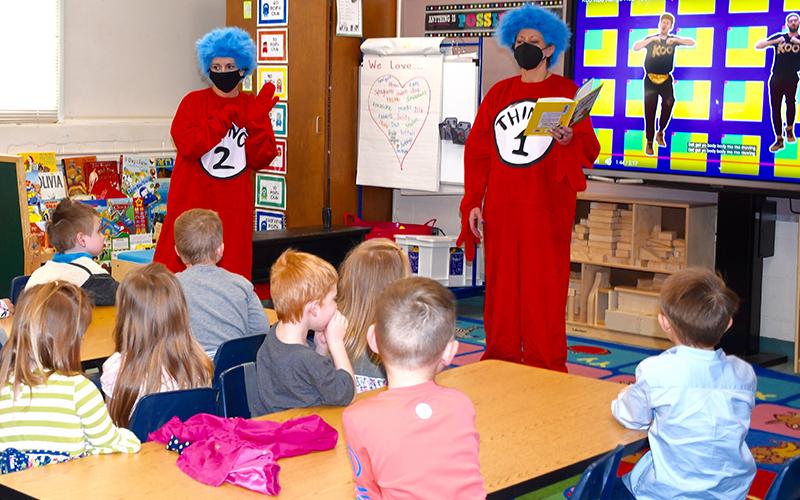West Fannin Elementary School Pre-K students excitedly listen as Thing 1 and Thing 2, also known as Principal Alison Danner and Assistant Principal Milly Rice, act out and read a Dr. Seuss story for Read Across America Week Tuesday, March 2.