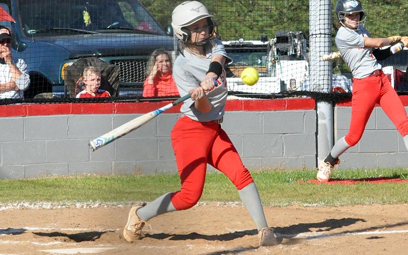 Lady Cougar Channing Beach makes contact with a ball in recent action for the Copper Basin  Lady Cougars softball team.