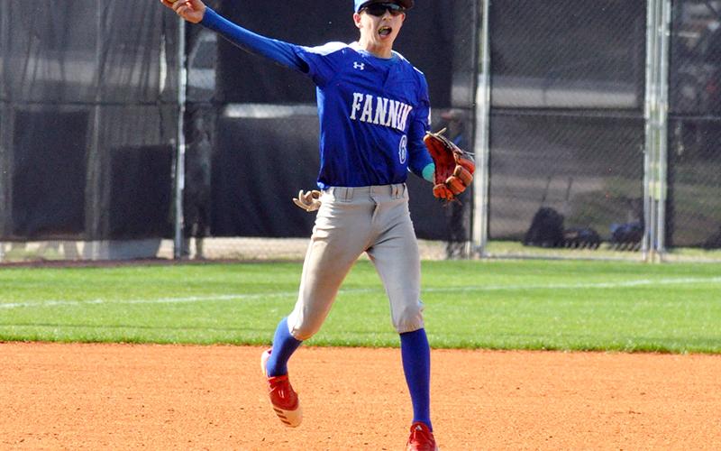 Gavin Davis slings a ball to first base for an out during the Rebels win against White County Tuesday, March 30. The Rebels finished the season with a 14-3 record.