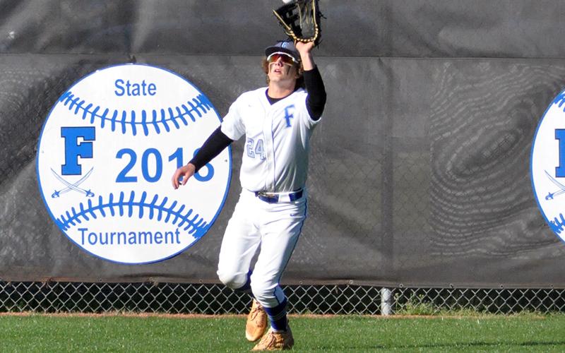Jason Pearson snags a fly ball in recent action for the Fannin County Rebels.