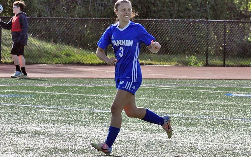 Madison Ponton is all smiles as she scored the first of her two goals in the first half of the Lady Rebels playoff game against Elite Scholars Academy Thursday, April 22.
