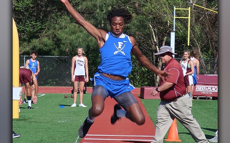 Andre Bivens competes in the Long Jump event in recent action for the Fannin County Track and Field team. Bivens took home first place in the Triple and Long Jump events.