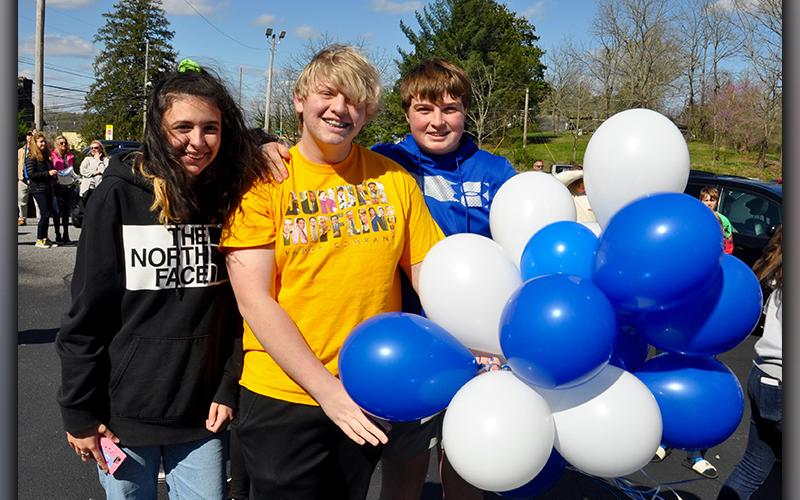 In memory of Shane Adrian “Dewey” Derreberry, friends Abby Ridings, Logan Sosebee and Baylor Twiggs, from left, attended a special balloon release Thursday, April 1.