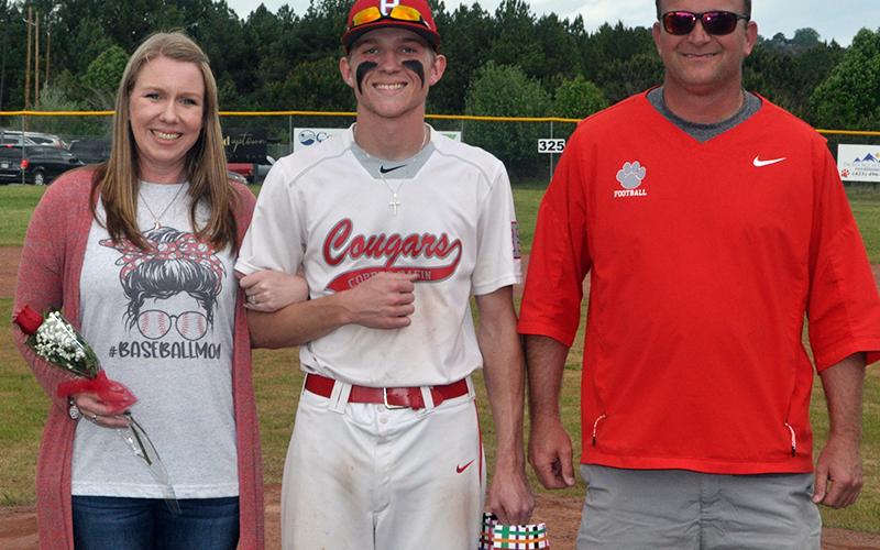 Bryson Grabowski was one of eight Copper Basin baseball seniors honored before the Cougars' game against Tellico Plains Thursday, April 29. Grabowski is shown with his parents, Chad and Amber Grabowski.