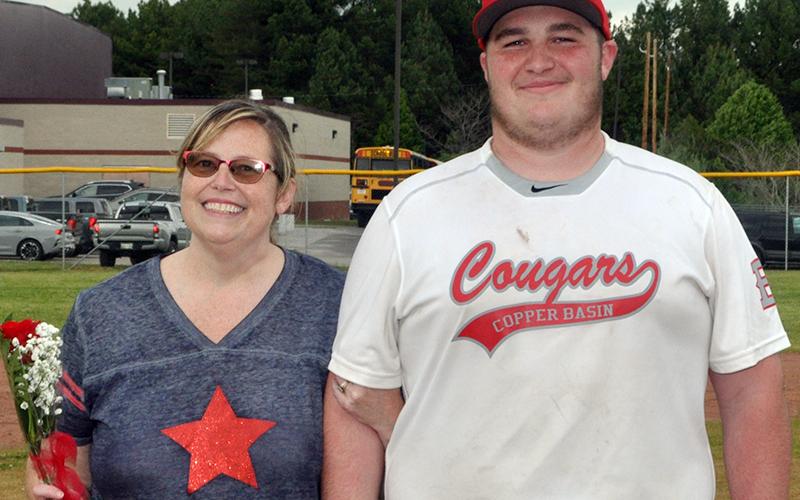 Copper Basin honored eight seniors on the last home game of the season Thursday, April 29, against Tellico Plains. Senior Chance Rollins was one of the eight seniors honored and is shown with his mother, Amanda Rollins.