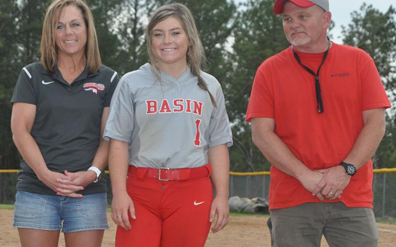 Kaitlyn Goode was honored after the Lady Cougars' softball game with Lookout Valley Thursday, April 29. Goode is shown with her parents David and Amy Goode.
