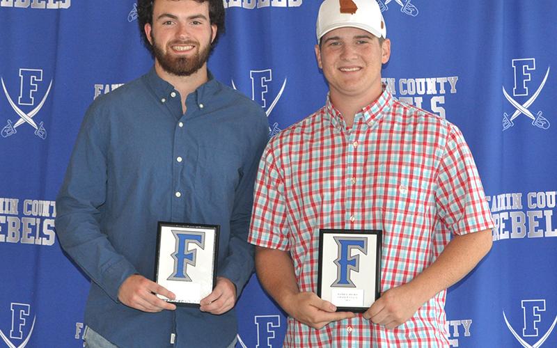 Sawyer Moreland, left, and Chance Stacy were awarded the Family Award at the Rebels baseball banquet Monday, May 17.