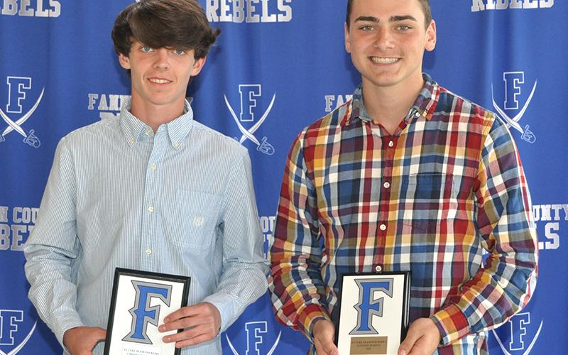 Christian Beavers, left, and Connor Martin were given the Future Diamond Rebel Award at the Rebels’ baseball banquet Monday, May 17. The award signifies someone who will be a key part of the team in the future.