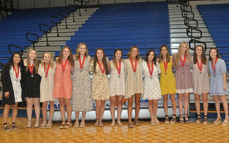 The Lady Rebels basketball team received medals for finishing their season as Runner-Ups in the Georgia High School Association State Championship. Shown during the medal ceremony are, from left, Prisila Bautista, Paige Foresman, Mackenzie Johnson, Abby Ledford, Olivia Sisson, Natalie Thomas, Becca Ledford, Reagan York, Jenna Young, Reigan O’Neal, Ava Queen, RIley Reeves, and Courtney Davis.
