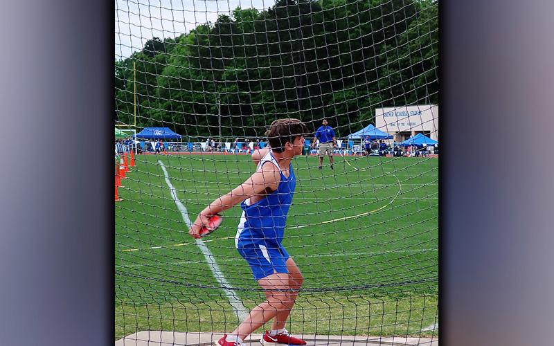 Matthew Crowder winds up for the Discus Throw at the 2A Sectional Regions Saturday, May 8. Crowder placed third and will advance to the state meet in the Discus event.