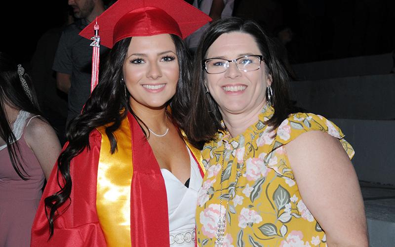 Copper Basin graduate Bailey Mundy and her mom, Jenny Mundy, were all smiles following graduation ceremonies. News Observer photo/Glenn Harbison