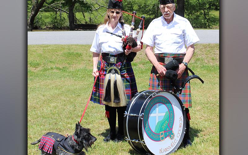 Appalachian St. Andrew's Pipes &amp; Drums of Blairsville, Georgia members Dorothy and Sid Bugg and their scottie, Archie, Troop enjoy Troop 32's Highland Games Saturday, May 1 after leading the procession of Boy Scouts.