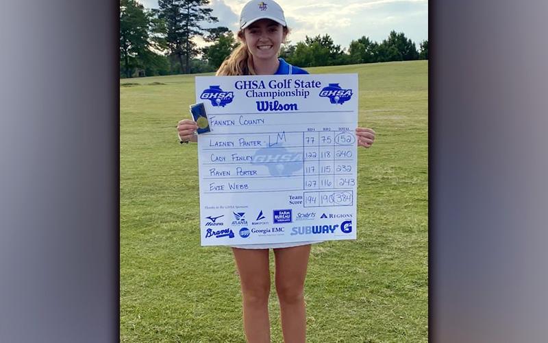Lady Rebel golfer Lainey Panter was all smiles as she showed off the Lady Rebels scorecard after she won the AA Girls Golf State Championship. Panter finished the tournament with a blazing score of 152.