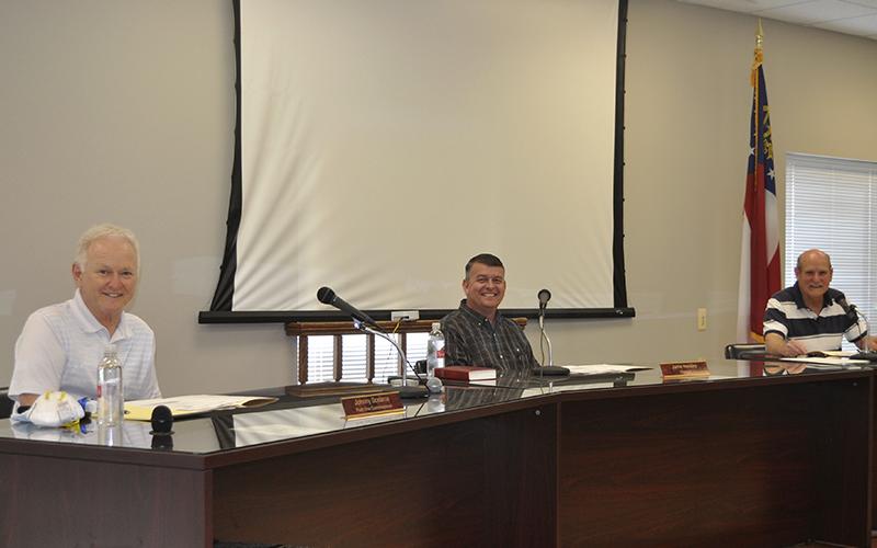 All together in person for the first time since Jamie Hensley and Johnny Scearce were elected in November, the Fannin County Board of Commissioners met in regular session Tuesday, May 18. Shown are, from left, Post One Commissioner Scearce, Chairman Hensley and Post Two Commissioner Glenn Patterson who began the third year of his term.