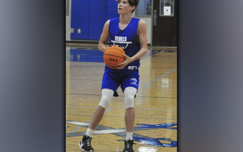 Fannin Rebel Riley Angel goes up for a three-point basket during the Rebels basketball scrimmage against Gilmer County Wednesday, June 16.