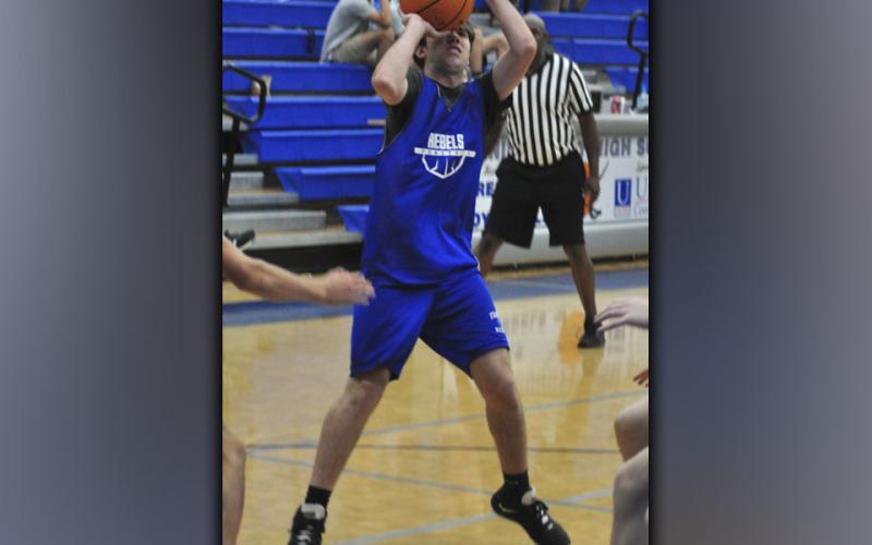 Jordan Bennett shoots a two-point jumper during the Rebels scrimmage against Gilmer County Wednesday, June 16.