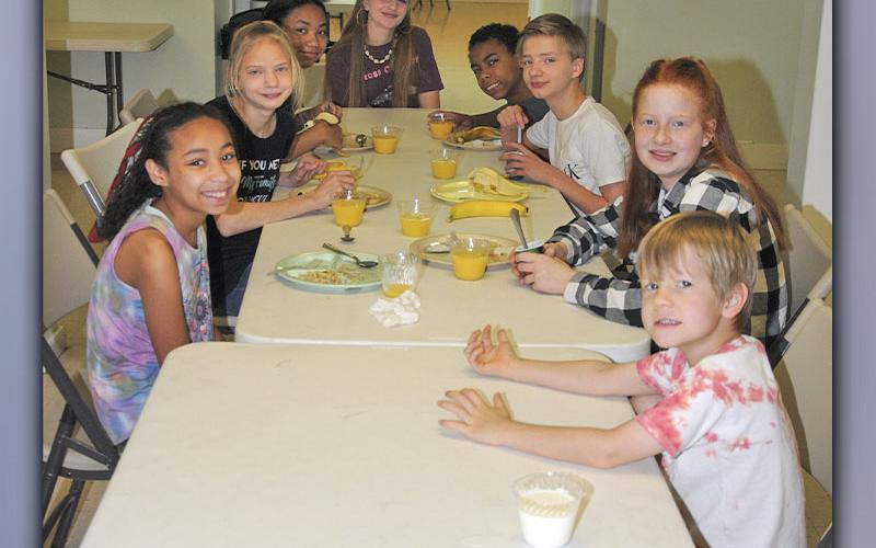 Rev. Victor Morgan and Patsy Wiliams of St. Luke’s Episcopal Church in Blue  Ridge were busy serving breakfast to Sunny D Children’s Theater campers last Friday.