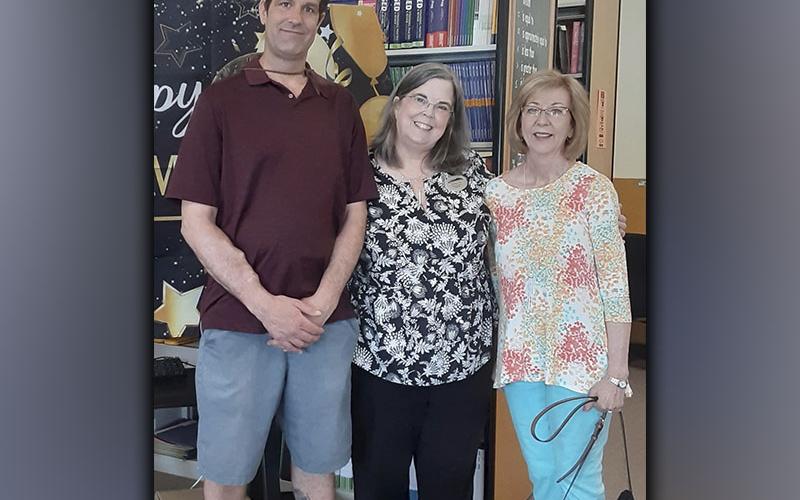 Fannin Literacy Action Group (FLAG) former student and graduate as well as a volunteer tutor celebrated with Donna Earl during her retirement reception Wednesday, June 9. Shown during the reception are, from left, former student and graduate Brian Ammann, Earl and vounteer tutor Kathy Barber.