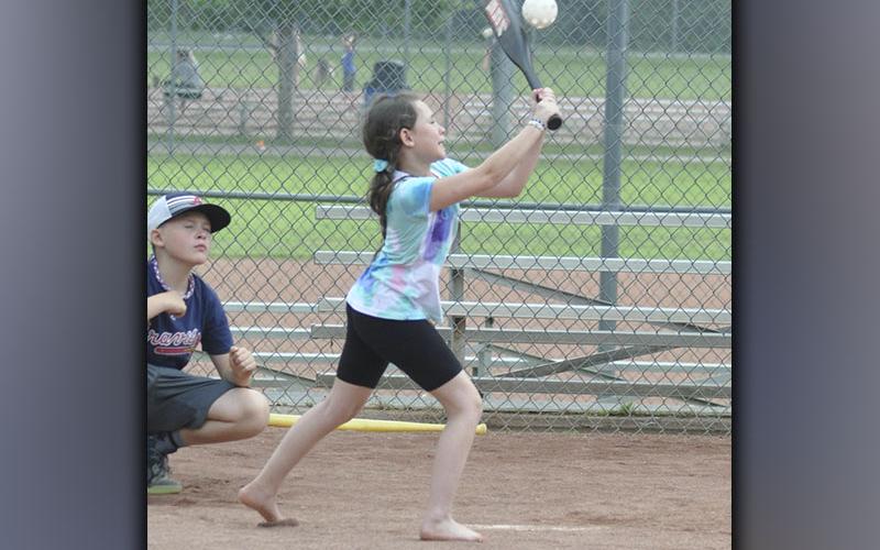 Jayden Miller crushes the wiffle ball during Summer Camp at the Fannin County Recreation Center Wednesday, June 9.