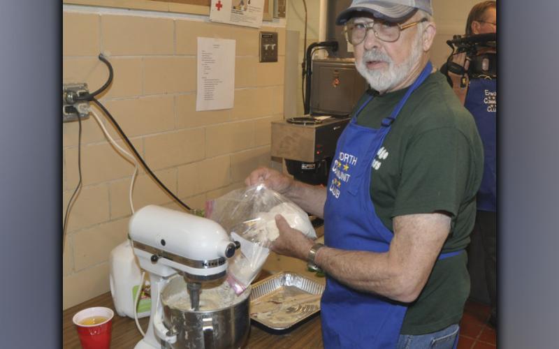 Volunteer Tom Hamby mixes up some pancake batter during the Epworth Community Club’s Pancake Breakfast Saturday, July 3.